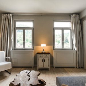 Boardinghouse Wohnbereich Blick zum Fenster - Inneneinrichtung Heidelberg, Mannheim, Stuttgart - Gaffga Interieur Design. Planung und Ausführung - Lichtplanung - Möbel auf Maß. Boardinghouse